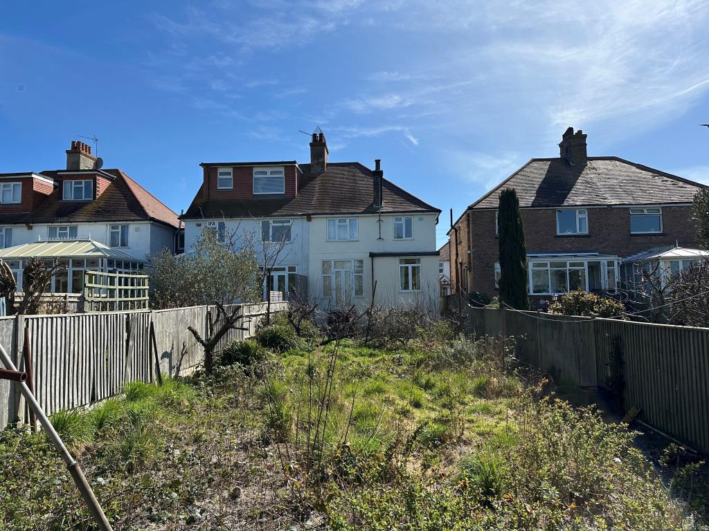 Lot: 149 - THREE-BEDROOM SEMI-DETACHED HOUSE - External of semi detached property from the back garden